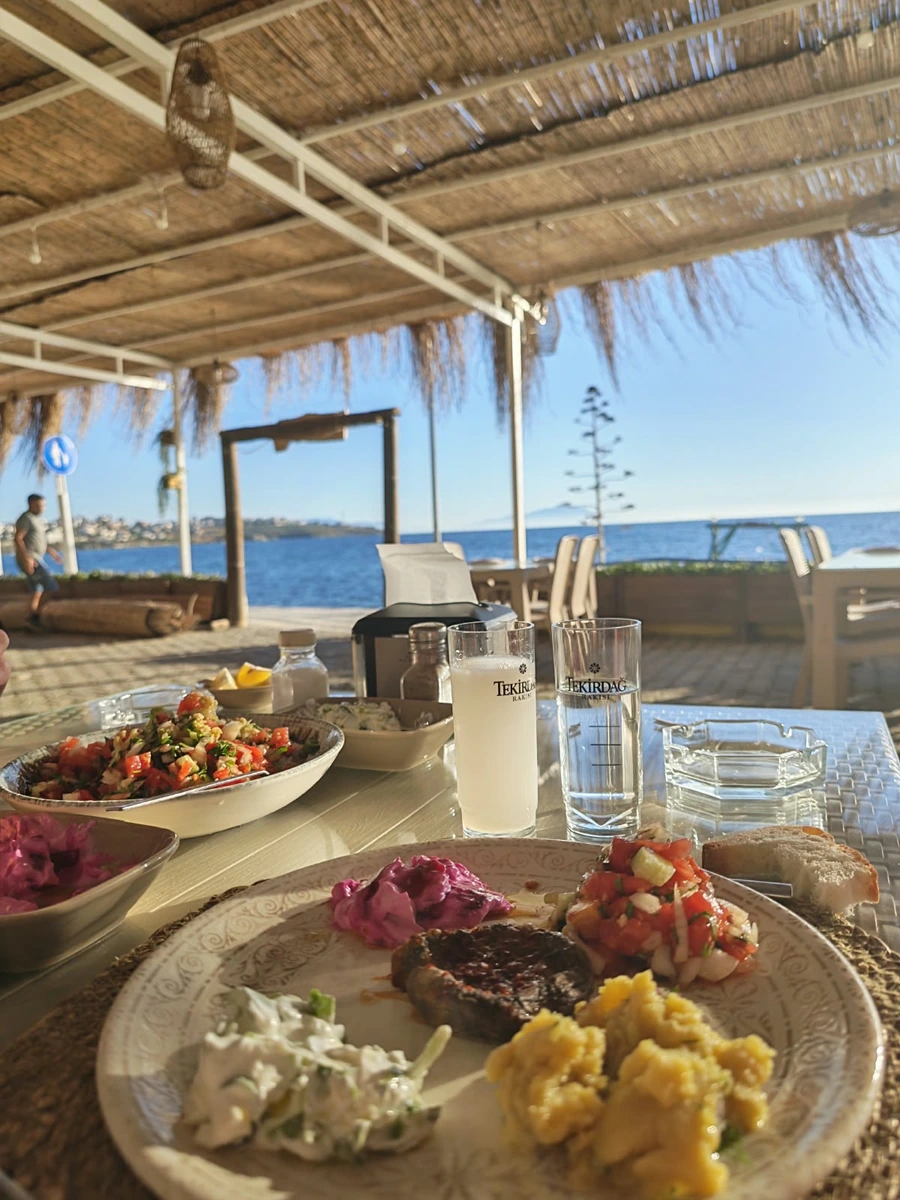 Traditional Turkish raki table with meze by the sea