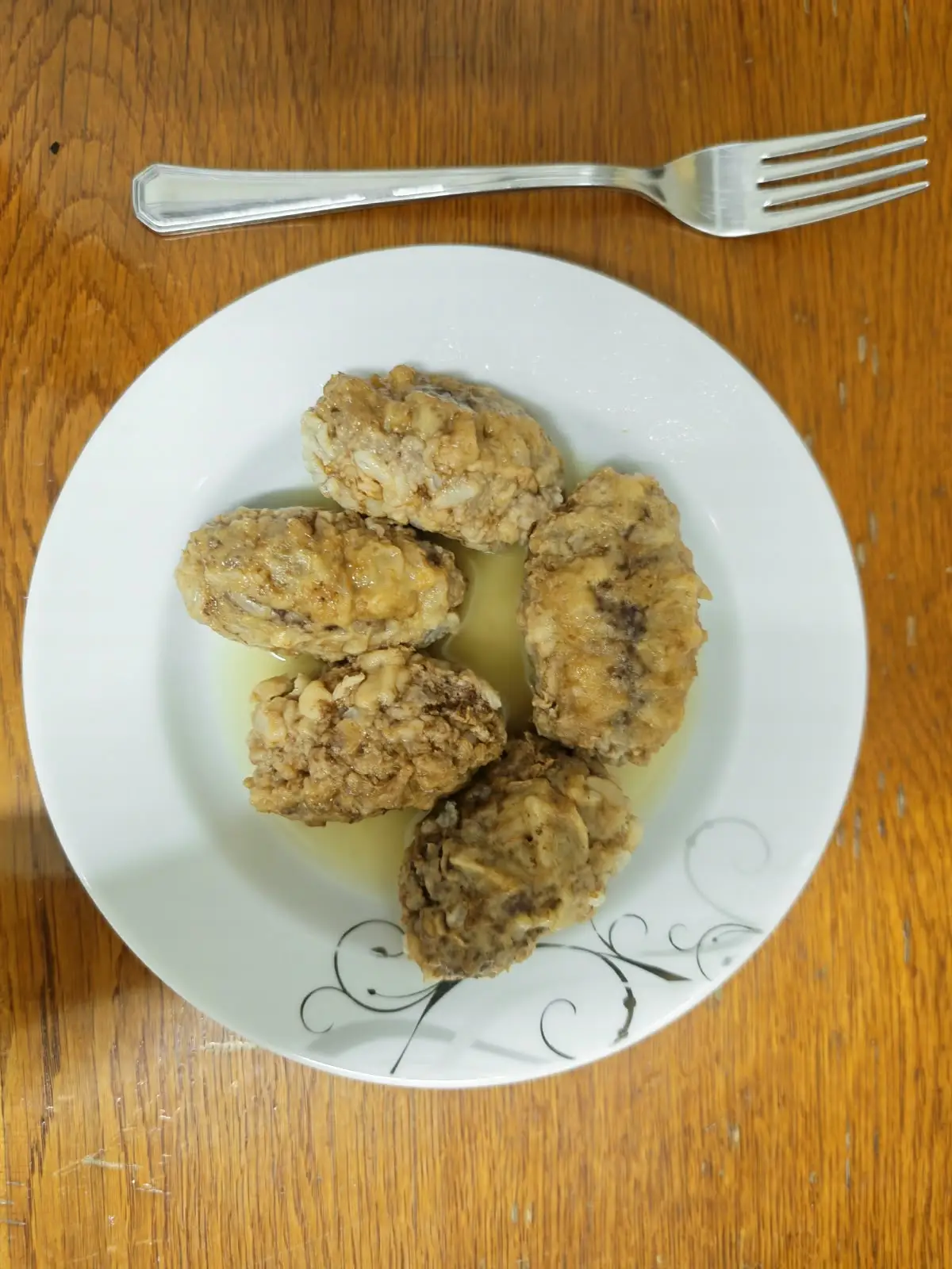 Homemade Yuvalaça served on a plate with cooking liquid in Seferihisar